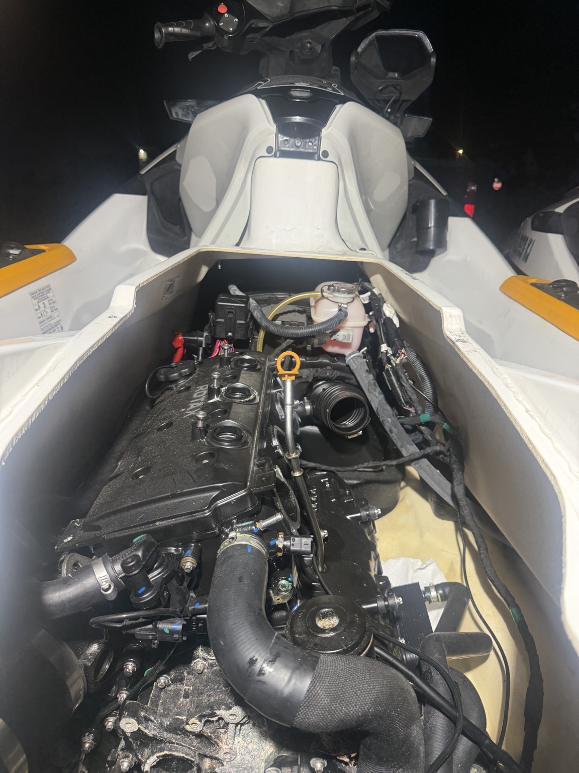 Powersports diagnostic inspection in a Sea-Doo engine bay